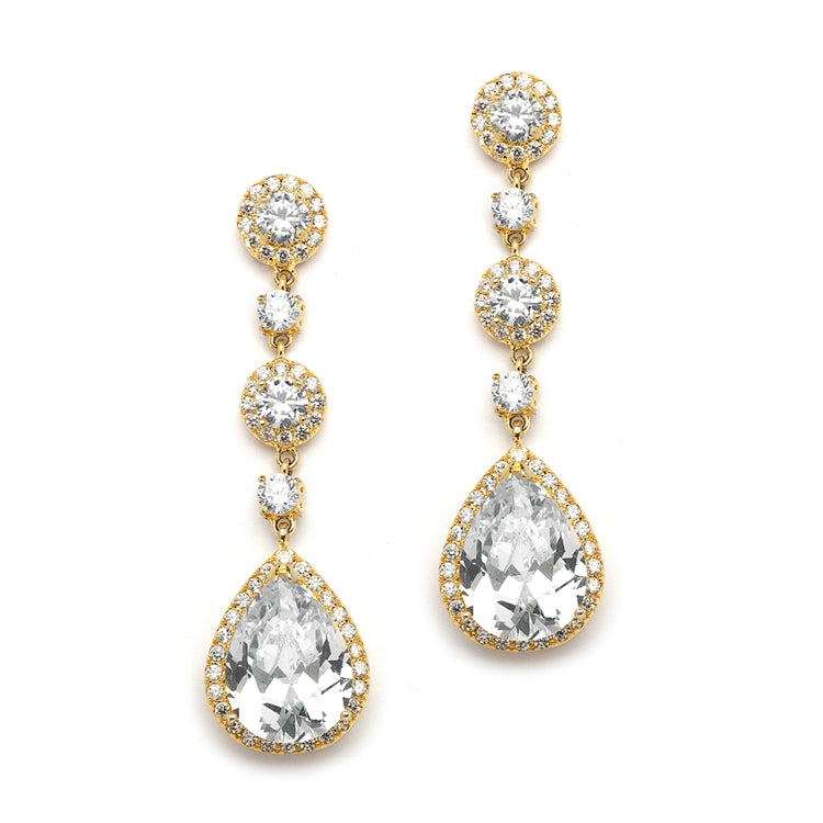 A pair of gold-plated cubic zirconia pear-shape drop earrings with rhinestone embellishments.