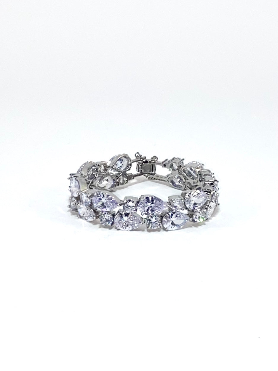 A silver-colored bridal bracelet adorned with sparkling clear cubic zirconia, designed for smaller wrists.