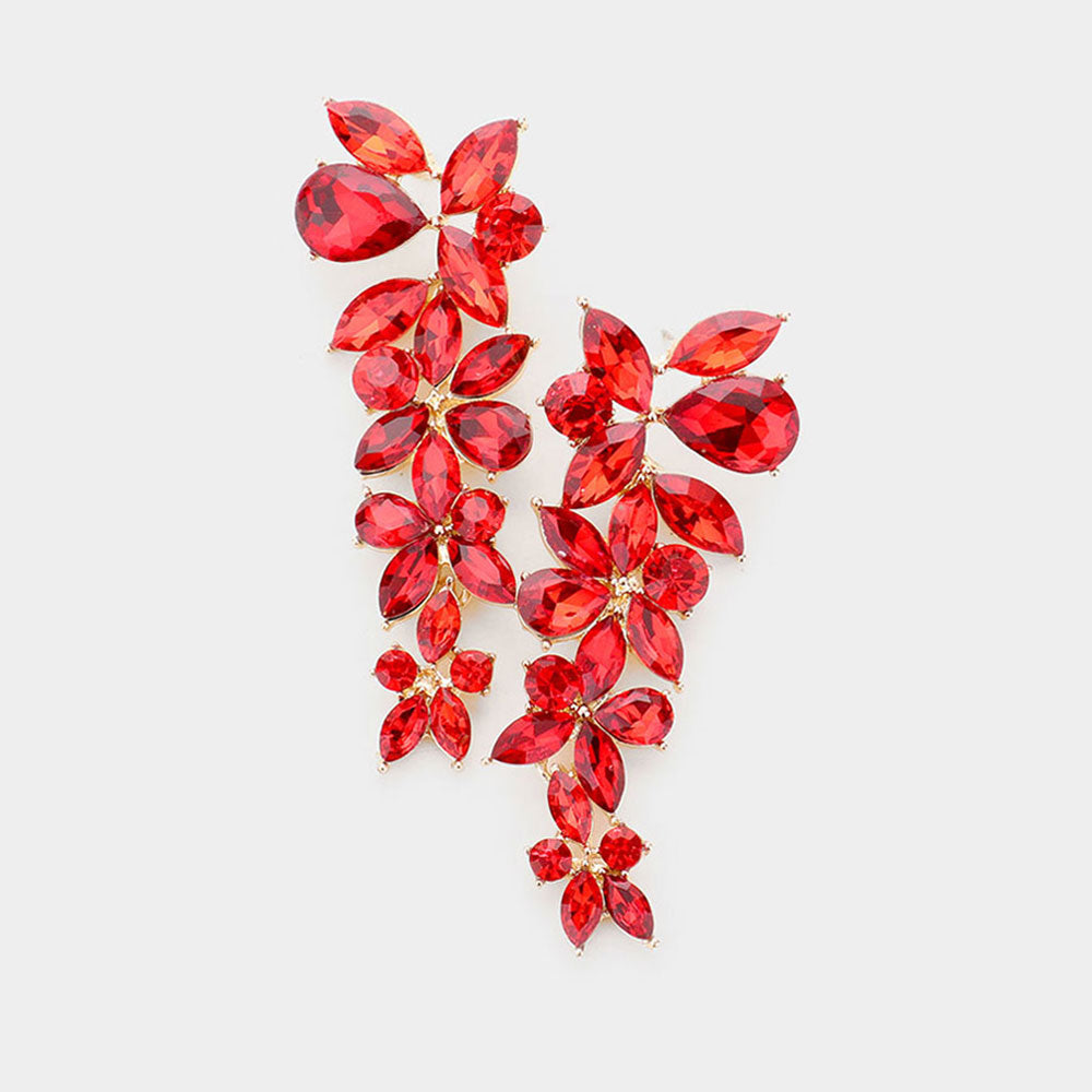 A pair of red floral earrings with rhinestone embellishments, designed for post back attachment.