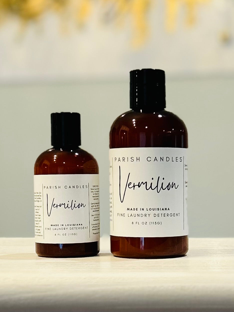 Vermilion laundry wash in brown bottle in 8 ounce and 4 ounce sizes on a white label 