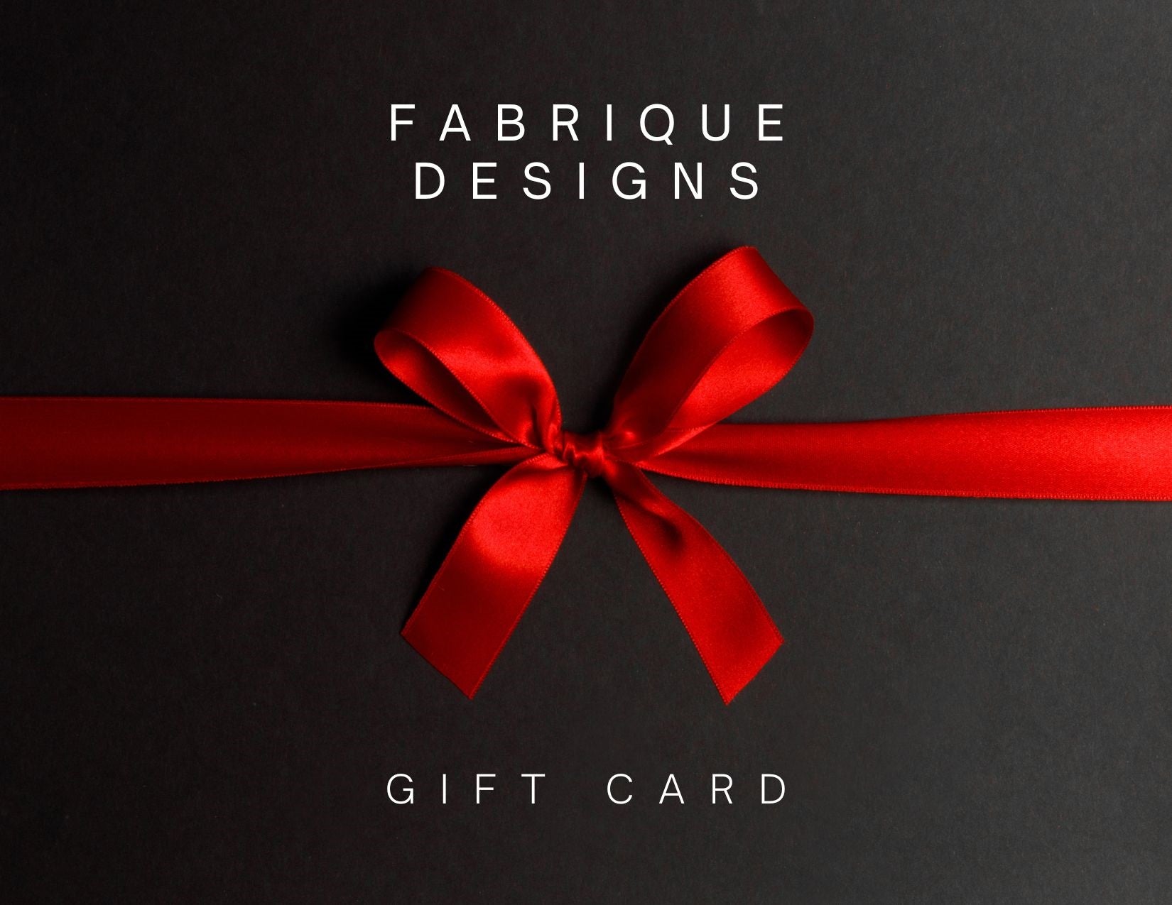 Gift card with a red ribbon on a black background, featuring 'Fabrique Designs' branding.