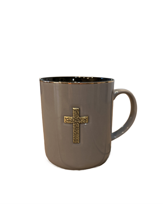 Gray mug with a gold cross on a white background