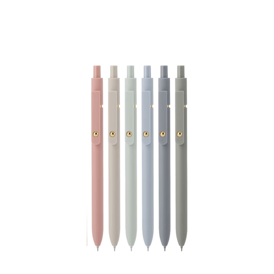 Set of five pens in pink, gray, and blue on a white background