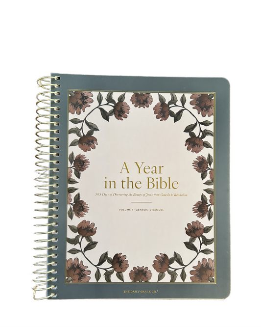 Bible journal with floral design and text 'A Year in the Bible' on a white background