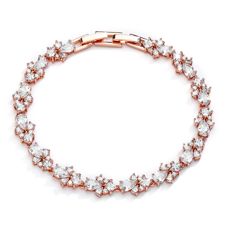 Rose gold bracelet with small teardrop and round cubic zirconia stones.