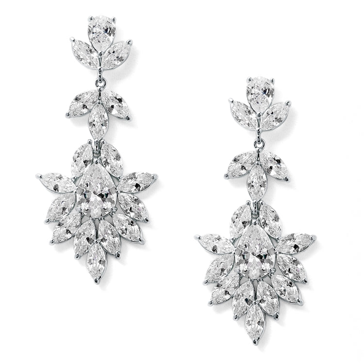 Silver floral shaped cubic zirconia earrings on a white background.