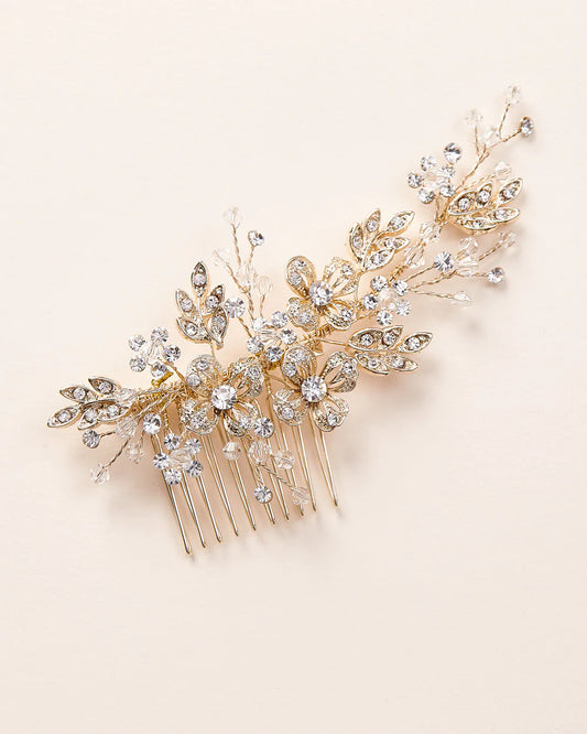 Gold bridal comb with metal gold flowers and rhinestones.