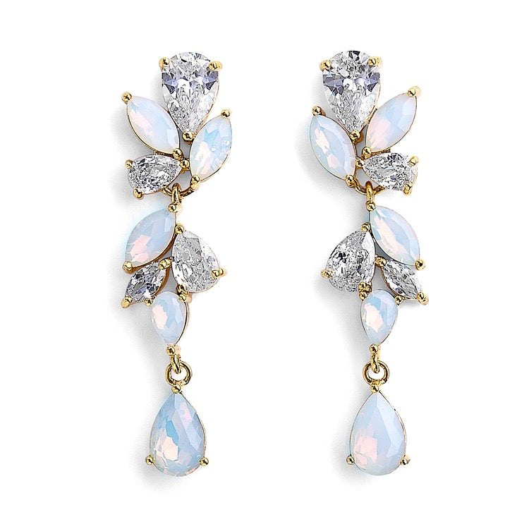 A pair of opal and cubic zirconia earrings with marquis and tear drop shaped stones, in gold tone metal.