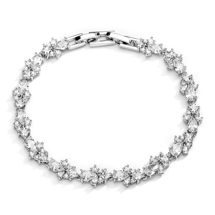 Silver bracelet with small teardrop and round cubic zirconia stones.